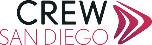 Logo for CREW San Diego with bold black text “CREW” above pink “SAN DIEGO” and three angled maroon lines forming a triangular arrow shape on the right.