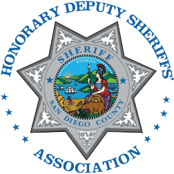 Seal reading “Honorary Deputy Sheriffs’ Association,” featuring a star emblem with a California state seal and “San Diego County Sheriff” written inside.